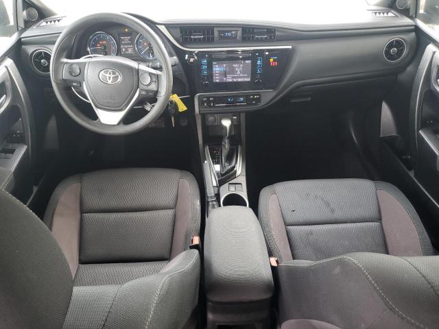 VIN 5YFBURHE4JP854224 2018 Toyota Corolla, L no.8