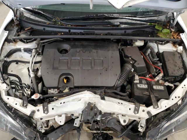 VIN 5YFBURHEXKP884717 2019 Toyota Corolla, L no.11