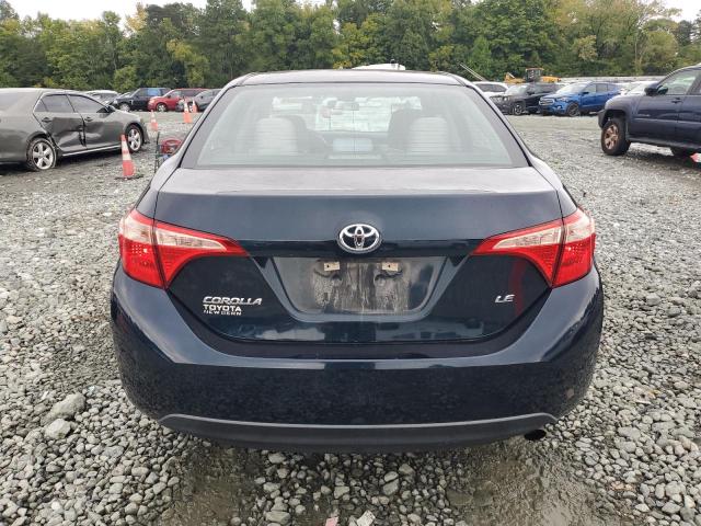 VIN 5YFBURHEXJP764706 2018 Toyota Corolla, L no.6