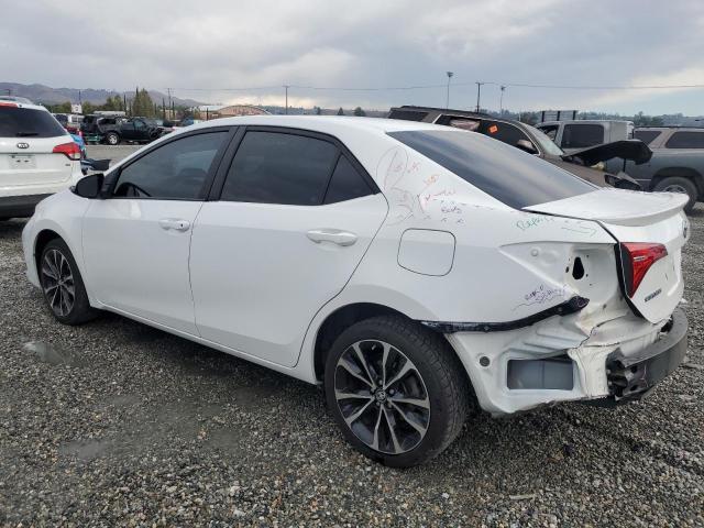 VIN 5YFBURHE7JP801386 2018 Toyota Corolla, L no.2