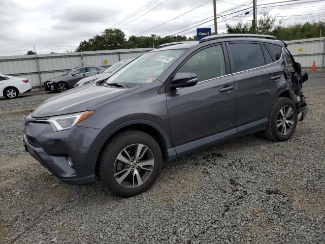 VIN JTMRFREV0JJ720246 2018 Toyota RAV4, Adventure no.1