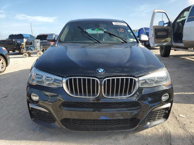 VIN 5UXXW7C54J0W63925 2018 BMW X4 no.5