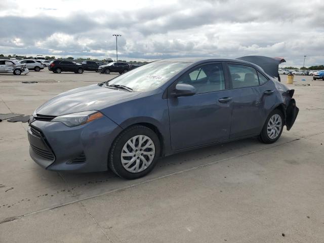 VIN 5YFBURHE8JP749962 2018 Toyota Corolla, L no.1