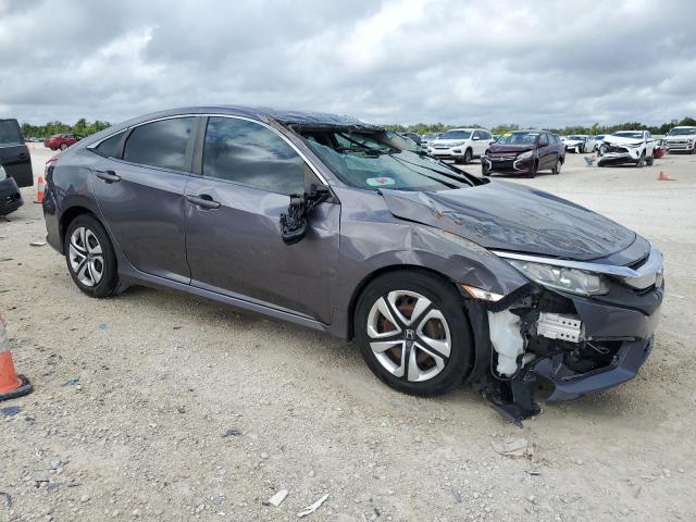 VIN 19XFC2F50JE016904 2018 Honda Civic, LX no.4