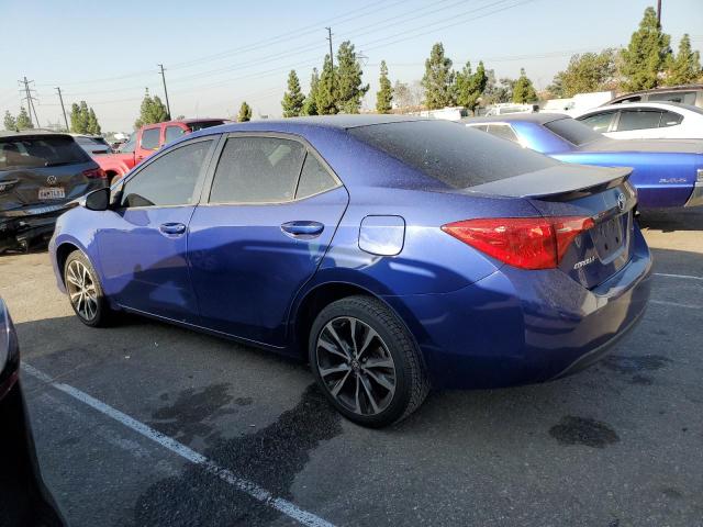 VIN 5YFBURHE4HP702003 2017 Toyota Corolla, L no.2