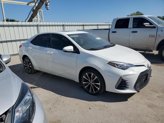 VIN 5YFBURHE3HP620912 2017 Toyota Corolla, L no.4