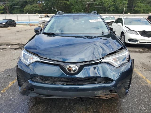 VIN JTMZFREV1HJ117509 2017 Toyota RAV4, LE no.5