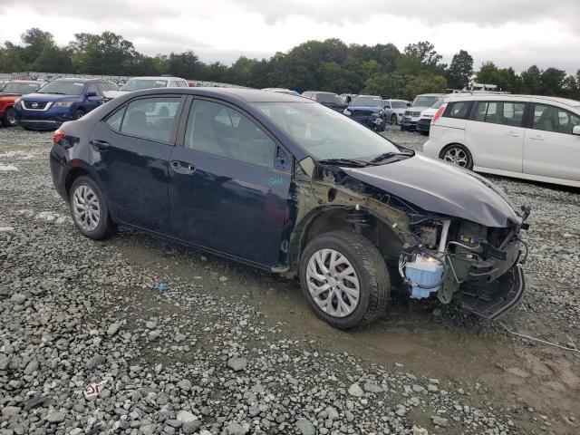 VIN 5YFBURHEXJP764706 2018 Toyota Corolla, L no.4