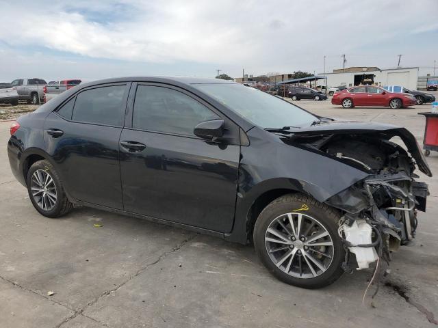 VIN 5YFBURHE6KP864285 2019 Toyota Corolla, L no.4