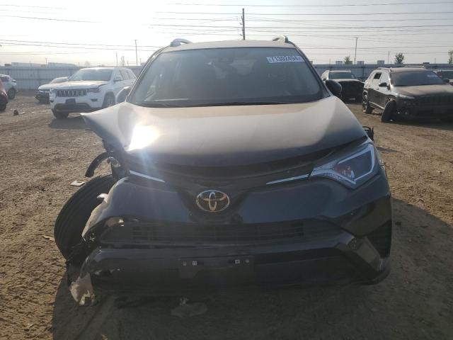 VIN JTMBFREV6JJ223901 2018 Toyota RAV4, LE no.5