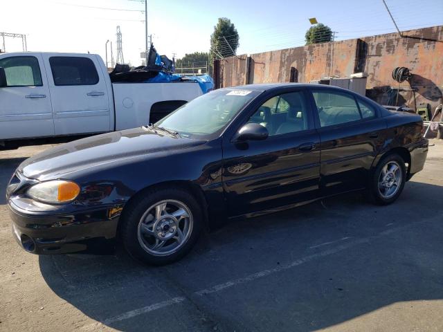 PONTIAC GRAND AM G 2002 black sedan 4d gas 1G2NW52E12M704539 photo #1