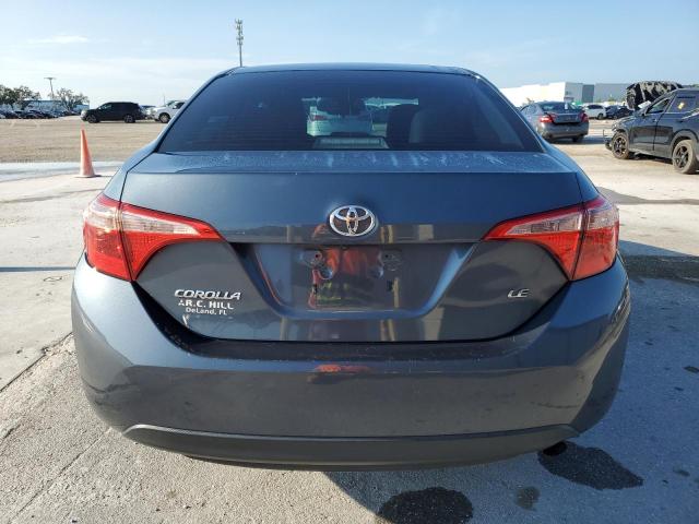 VIN 5YFBURHE4JP838671 2018 Toyota Corolla, L no.6