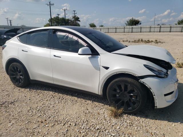 VIN 7SAYGDEE4PA047747 2023 Tesla MODEL Y no.4