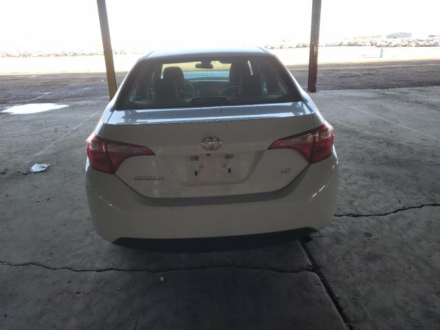 VIN 5YFBURHE3JP803040 2018 Toyota Corolla, L no.6