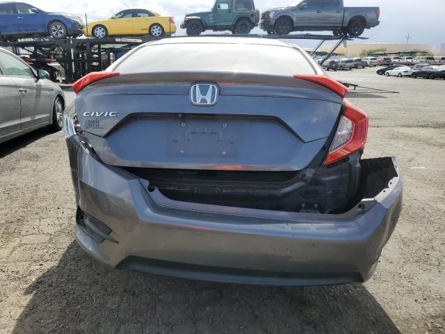 VIN 19XFC2F51GE005368 2016 Honda Civic, LX no.6