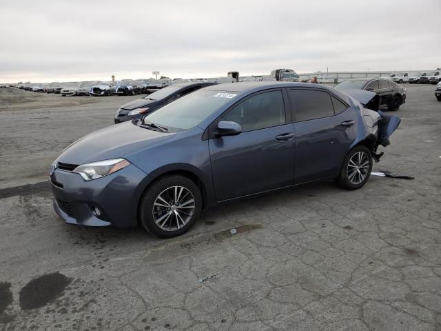 VIN 5YFBURHE1GP422831 2016 Toyota Corolla, L no.1