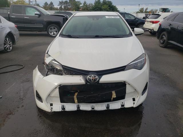 VIN 5YFBURHEXKP890131 2019 Toyota Corolla, L no.5