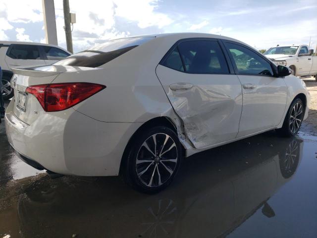 VIN 5YFBURHE4JP797104 2018 Toyota Corolla, L no.3