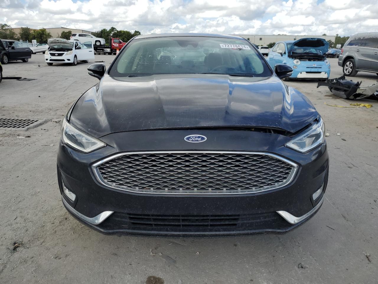 Lot #2857050028 2019 FORD FUSION TIT