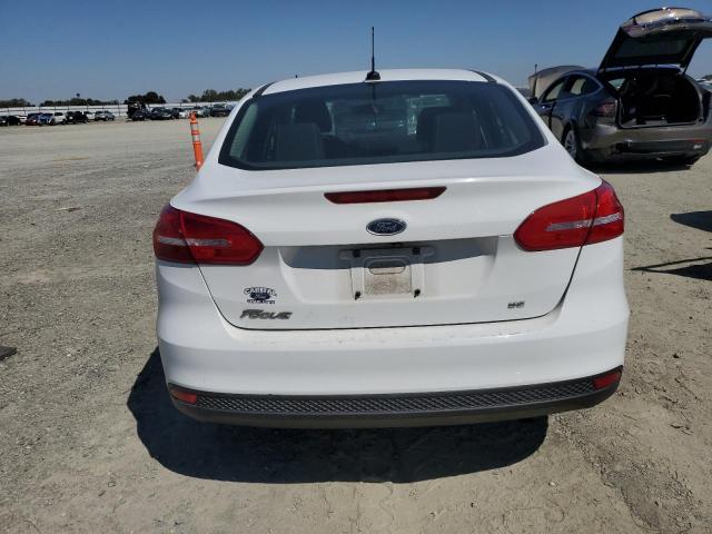 VIN 1FADP3F2XJL219870 2018 Ford Focus, SE no.6