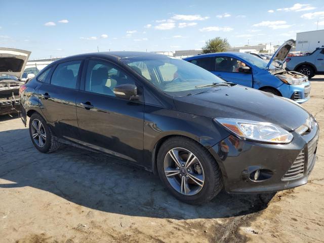 VIN 1FADP3F27EL387410 2014 FORD FOCUS no.4