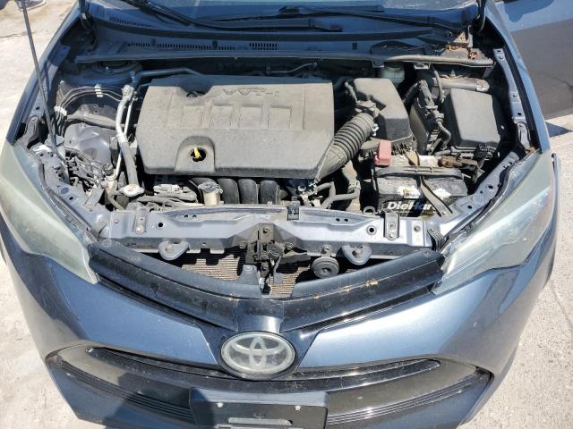 VIN 5YFBURHE0HP704766 2017 Toyota Corolla, L no.11