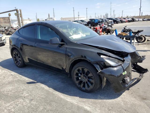 VIN 7SAYGAEE1PF849643 2023 TESLA MODEL Y no.4