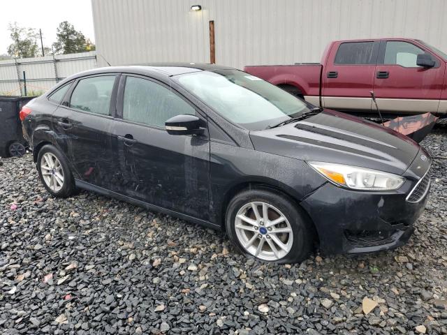 VIN 1FADP3F21FL233700 2015 Ford Focus, SE no.4