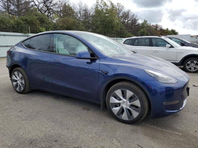 VIN 7SAYGDEEXPF799228 2023 Tesla MODEL Y no.4