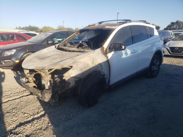 VIN 2T3ZFREV0JW459749 2018 Toyota RAV4, LE no.1