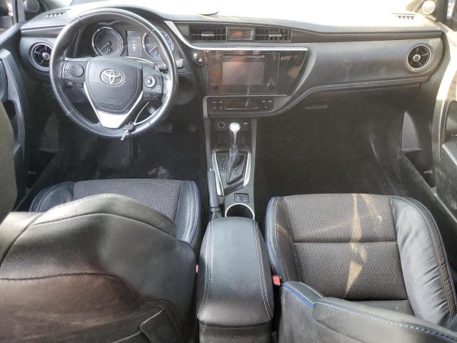 VIN 5YFBURHE4JP800048 2018 Toyota Corolla, L no.8