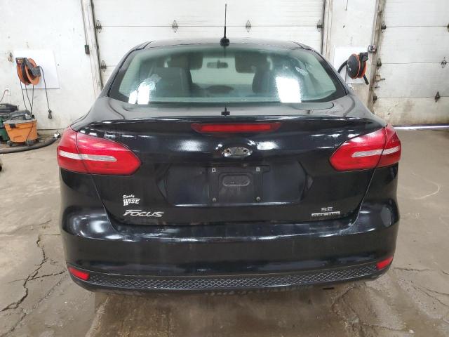 VIN 1FADP3F24GL368946 2016 Ford Focus, SE no.6