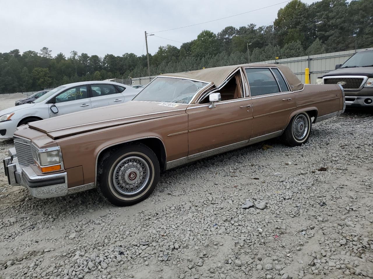 CADILLAC BROUGHAM 1988 brown  gas 1G6DW51Y5J9727006 photo #1