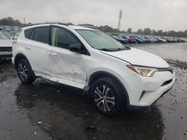 VIN JTMBFREV6HJ135277 2017 Toyota RAV4, LE no.4