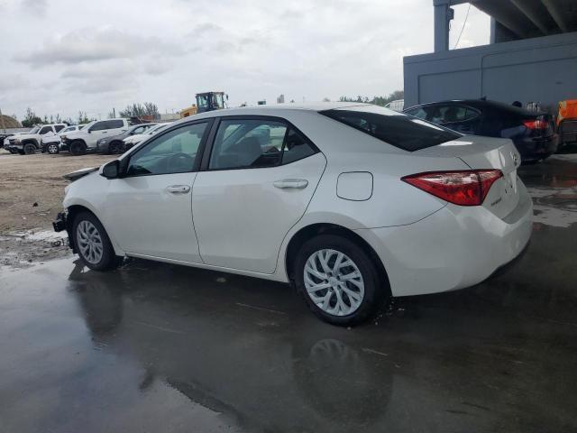 VIN 5YFBURHE4JP854224 2018 Toyota Corolla, L no.2