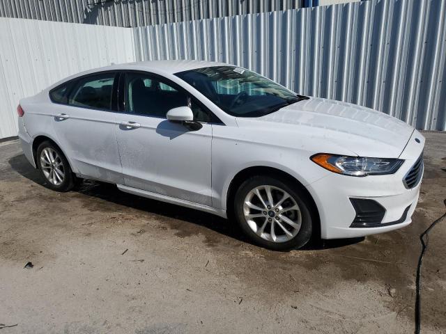 VIN 3FA6P0HD4KR128084 2019 Ford Fusion, SE no.4