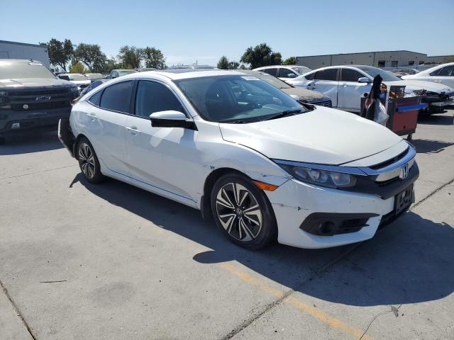 VIN 19XFC1F39GE223566 2016 Honda Civic, EX no.4