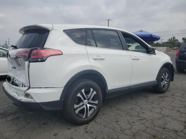 VIN JTMZFREV4JJ159484 2018 Toyota RAV4, LE no.3