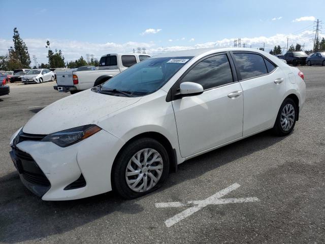 VIN 5YFBURHEXJP816867 2018 Toyota Corolla, L no.1