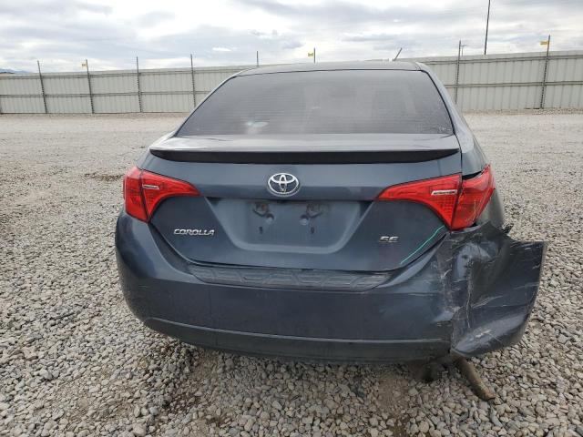 VIN 5YFBURHE4JP800048 2018 Toyota Corolla, L no.6