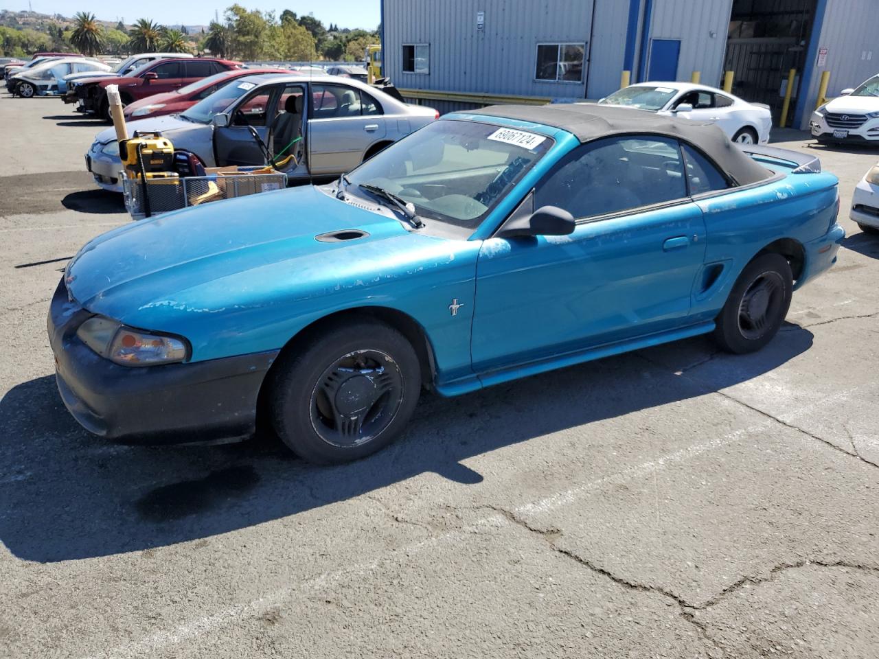 FORD MUSTANG 1994 teal converti gas 1FALP4444RF217094 photo #1