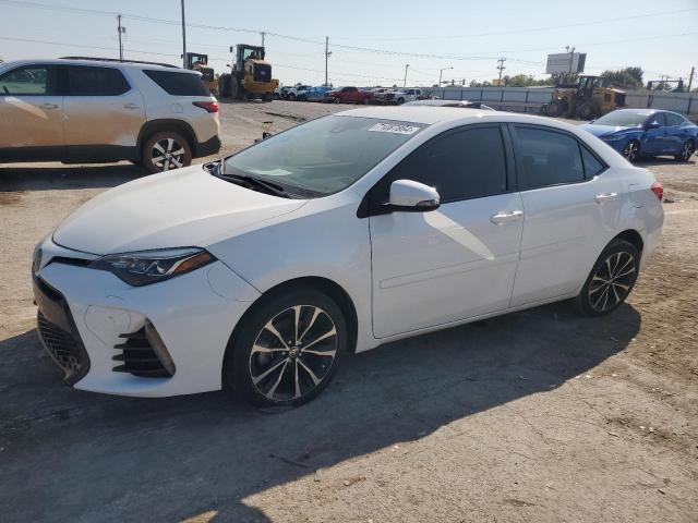 VIN 5YFBURHE9HP686056 2017 Toyota Corolla, L no.1