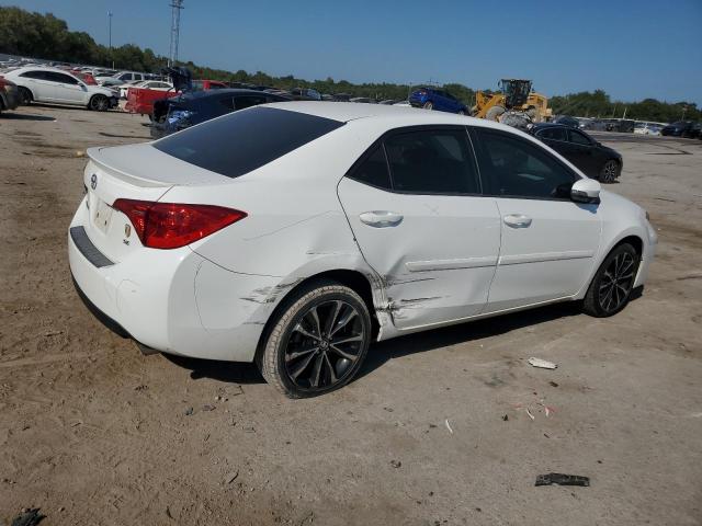 VIN 5YFBURHE9HP686056 2017 Toyota Corolla, L no.3