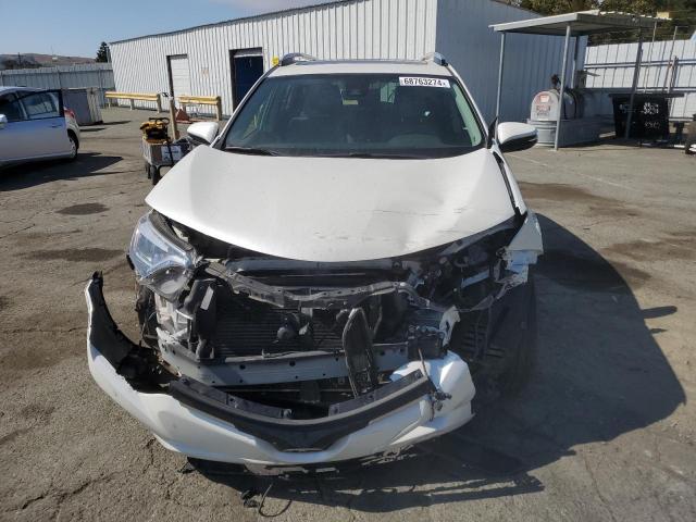 VIN JTMDFREV9GJ054992 2016 Toyota RAV4, Limited no.5