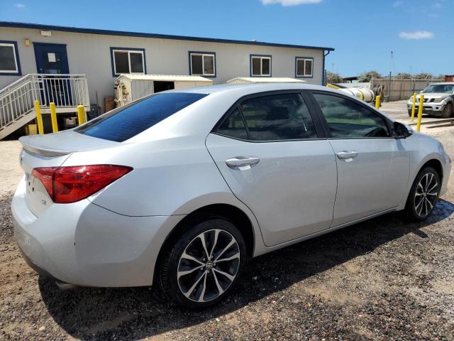 VIN 5YFBURHE5JP811253 2018 Toyota Corolla, L no.3