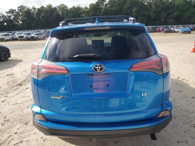 VIN JTMZFREV8JJ730104 2018 Toyota RAV4, LE no.6