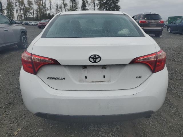 VIN 5YFBURHE4HP613645 2017 Toyota Corolla, L no.6