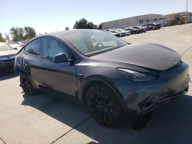 VIN 7SAYGDEE9PF970633 2023 Tesla MODEL Y no.4