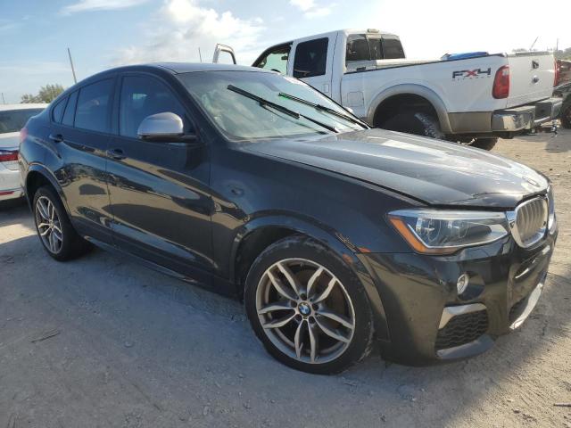 VIN 5UXXW7C54J0W63925 2018 BMW X4 no.4