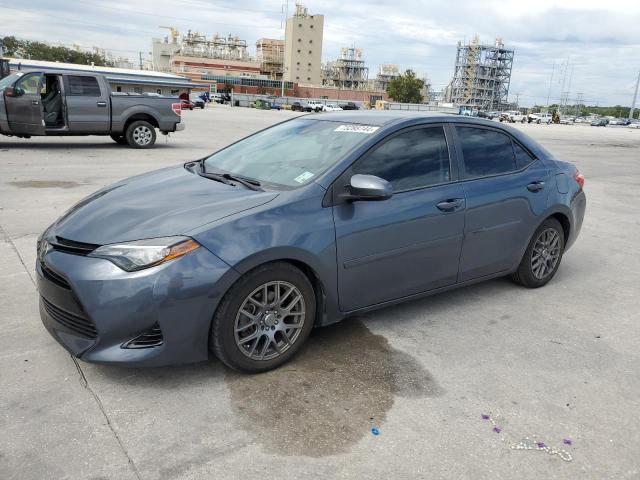 VIN 5YFBURHE4HP648329 2017 Toyota Corolla, L no.1